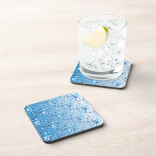 Intricate blue and white stars and snowflakes coaster