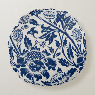 Intricate blue floral pattern on light background round cushion
