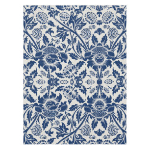 Intricate blue floral pattern on light background tablecloth