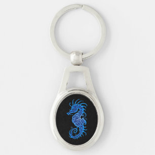 Intricate Blue Seahorse Design on Black Key Ring