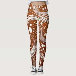 Intricate Elegance: White Design on Brown Leggings