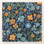 Intricate Floral Art: Blue and Orange Flowers  Glass Coaster<br><div class="desc">Vibrant floral pattern with blue and orange flowers and green leaves on a dark background. Intricate,  lively design with an elegant,  artistic feel.</div>