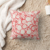 Intricate textile design featuring red, gold, and 