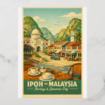 Ipoh City, Malaysia retro travel Foil Holiday Postcard<br><div class="desc">Travel poster featuring Ipoh City, Malaysia, in a charming retro travel-poster style. Central scene showing limestone karst hills surrounding Ipoh, colonial-era buildings, traditional shophouses, and a calm street café atmosphere. Include subtle details like white coffee cups, old railway architecture, and tropical greenery. Warm nostalgic color palette: cream, teal, muted green,...</div>