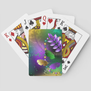 Iridescent mardi gras background with beads playing cards