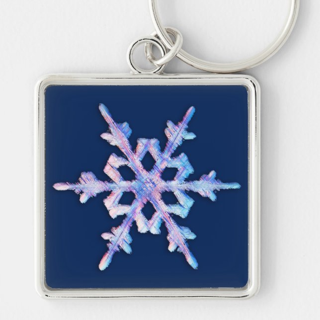 Iridescent snowflake on dark blue key ring (Front)