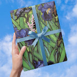 Irises by Vincent van Gogh, Vintage Garden Art Wrapping Paper<br><div class="desc">Irises (1889) by Vincent van Gogh is a vintage fine art post impressionism landscape floral painting featuring a garden with purple bearded irises growing by orange poppies. A single white iris flower is blooming at the edge. About the artist: Vincent Willem van Gogh (1853 -1890) was one of the most...</div>