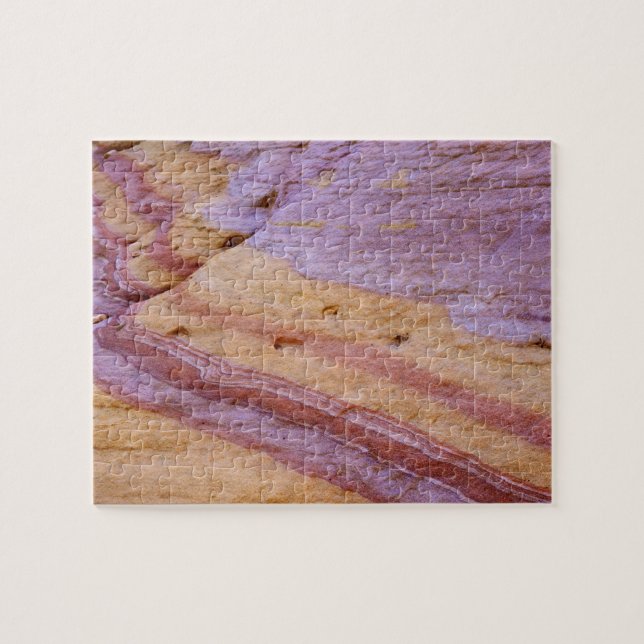 Iron oxides colour a sandstone formation jigsaw puzzle (Horizontal)