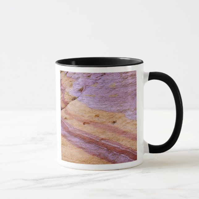 Iron oxides colour a sandstone formation mug (Right)