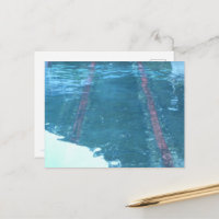Iron rails laid in the shallows of the sea.
