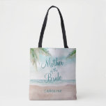 Island Breeze Painted Beach Mother of the Bride Tote Bag<br><div class="desc">Island Breeze Painted Beach Scene, with Ocean Waves, Sandy Beach, and Palm Trees, with a beautiful teal blue sky. With Modern Typography Script Fonts. A Summer Tropical Beach, Or destination wedding design - Personalised Mother of the Bride Tote Bags! ~ Check my shop to see the entire wedding suite for...</div>