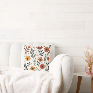 It is a pillow decorated with various flowers