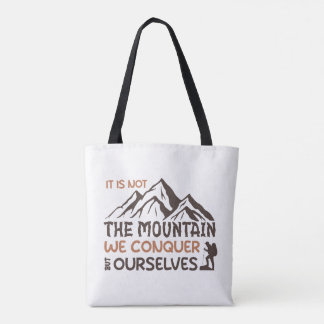 it is not the mountain we conquer but ourselves tote bag