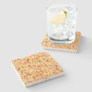 It looks like a halved cabbage, yellow and coral stone coaster