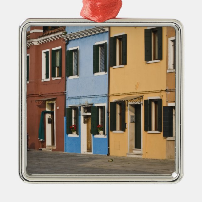 Italy, Burano. Colourful row of homes and empty Metal Tree Decoration (Front)