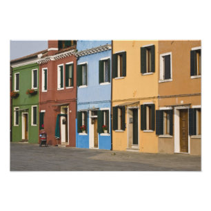 Italy, Burano. Colourful row of homes and empty Photo Print