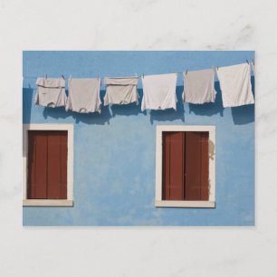 Italy, Burano. Hanging laundry and windows along Postcard