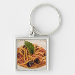Italy, Positano. Plate of pasta and eggplant. Key Ring