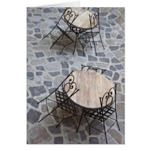 Italy, Sardinia, Castelsardo. Cafe tables.