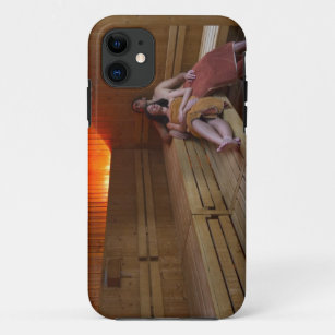Italy, Tuscany, Young couple relaxing in sauna iPhone 11 Case