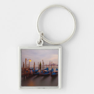 Italy, Venice. Anchored gondolas at twilight. Key Ring