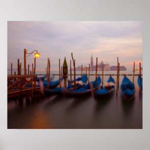 Italy, Venice. Anchored gondolas at twilight. Poster