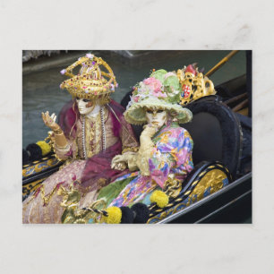 Italy, Venice. Couple dressed in costumes for Postcard