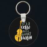 It's A Cello Not Giant Violin Funny Musician Key Ring<br><div class="desc">Vintage retro orchestra music fan design for those playing string musical instrument in a music band or symphony. Cool classical music lover merchandise for cellist, musician and artist. Perfect for cello music teacher, orchestra fan and those who love to play cello or just love music. Great souvenir, Christmas gift and...</div>
