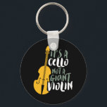 It's A Cello Not Giant Violin Funny Musician Key Ring<br><div class="desc">Vintage retro orchestra music fan design for those playing string musical instrument in a music band or symphony. Cool classical music lover merchandise for cellist, musician and artist. Perfect for cello music teacher, orchestra fan and those who love to play cello or just love music. Great souvenir, Christmas gift and...</div>