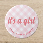 It's a Girl Gingham Baby Shower 7.5 Cm Round Badge<br><div class="desc">This baby shower button features a pastel pink and white gingham check background, evoking a sense of southern charm. The message "it's a girl" in stylish cursive lettering ensures the button is eye-catching while maintaining an air of casual elegance. The button reflects a classic preppy yet contemporary feel, suitable for...</div>