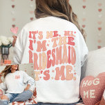 It's Me Hi I'm the Bridesmaid It's Me Personalised T-Shirt<br><div class="desc">The "It's Me, Hi I'm the Bridesmaid, It's Me" Personalised T-Shirt is not just a shirt, it's a trendy and cute gift for bridesmaids that adds a touch of peachy coral pink coolness to your bachelorette party. This custom shirt stands out with its groovy and aesthetic retro wavy text, personalised...</div>
