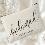 Ivory Cream Bridesmaid Modern Calligraphy Accessory Pouch<br><div class="desc">Celebrate your bridal party with this elegant ivory cream bridesmaid accessory pouch. Featuring modern calligraphy and customisable with your bridesmaid's name, this pouch is both stylish and practical. The soft dusty sage colour and elegant script create a sophisticated look, perfect for holding makeup, toiletries, or other essentials. This personalised pouch...</div>