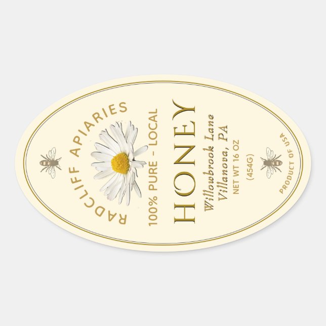Ivory oval honey label with heraldic bees, daisy (Front)