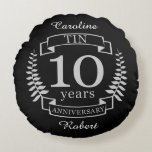 Ivory Traditional wedding anniversary 10 years Round Cushion<br><div class="desc">A design to celebrate 10 years of marriage. This design has a Grey / silver (the traditional colour for this anniversary) coloured laurel design on a black background. Tin is the traditional gift for this occasion. The text reads Tin 10 years anniversary. A romantic design to celebrate your 10th year...</div>