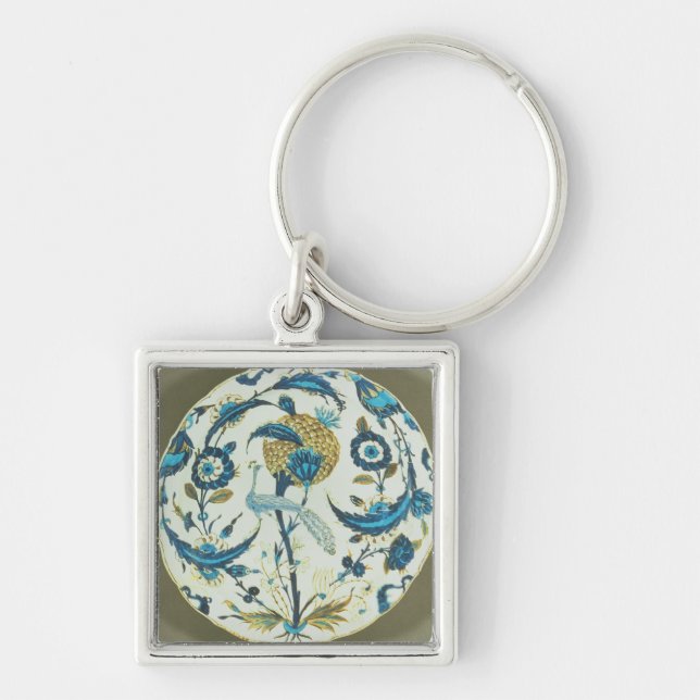 Iznik dish painted with a peacock perched among fl key ring (Front)