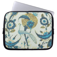 Iznik dish painted with a peacock perched among fl