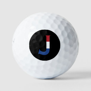 J Monogram overlaid on NLD Flag on bk be6 gbcnt Golf Balls