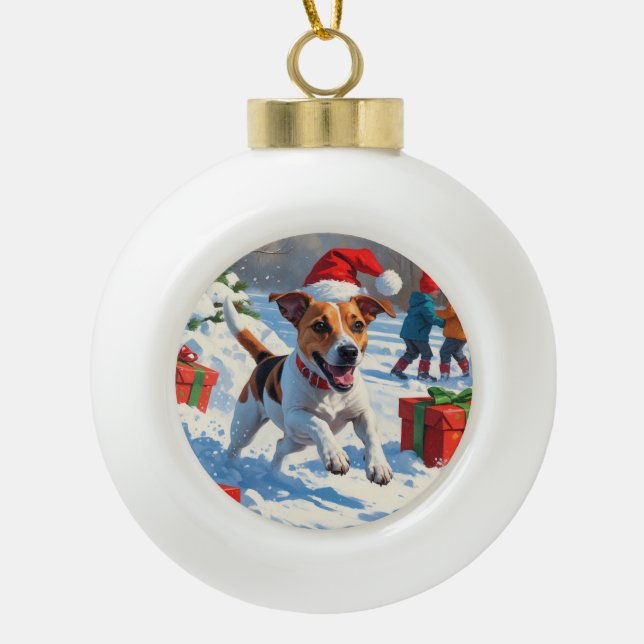 Jack Russell Running in Snow with Christmas Hat Ceramic Ball Christmas Ornament (Front)