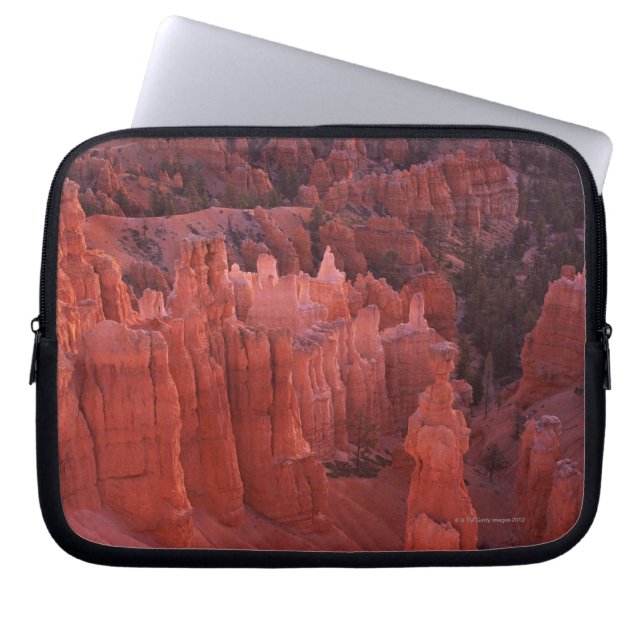 Jagged rock formations in desert laptop sleeve (Front)