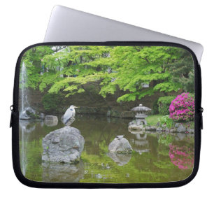 Japan, Kyoto. Heron in fresh green leaves Laptop Sleeve