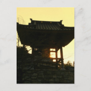 Japanese bell tower at sunset postcard