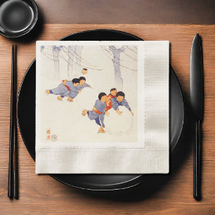 Japanese children rolling large snow balls napkin