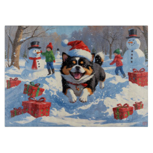 Japanese Chin Running in Snow with Christmas Hat Cutting Board