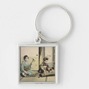 Japanese girls playing the flute, 'koto' and samis key ring