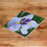Japanese Iris Bloom Floral Tile<br><div class="desc">Ceramic tile that features the photo image of a Japanese Iris bloom with purple,  white,  and yellow petal colours . A lovely,  floral design! Select your tile size. Makes a pretty kitchen trivet!</div>