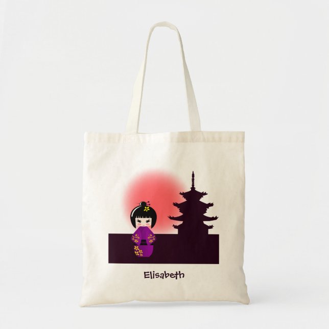 Japanese kokeshi doll at temple during sunset tote bag (Front)