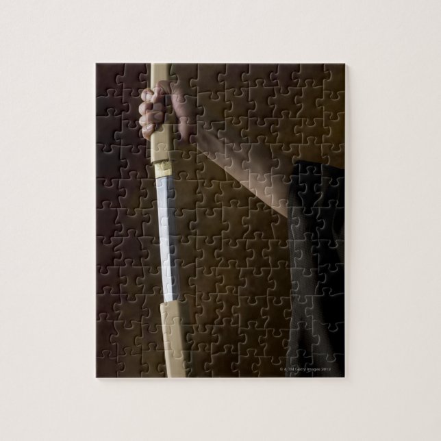 Japanese man holding sword 2 jigsaw puzzle (Vertical)