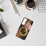 Jazzman Playing Gold Saxophone Samsung Galaxy Case<br><div class="desc">For music lovers! Protect your Samsung Galaxy S22 phone with this trendy phone case that features the photo image of a jazzman playing his time-worn,  gold coloured,  tenor saxophone horn. Select your phone style.</div>