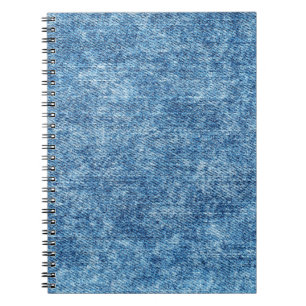 Jeans in acid wash blue. Denim background, texture Notebook