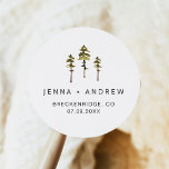 JENNA Rustic Pines Forest Wedding Favour Classic Round Sticker<br><div class="desc">This wedding favour sticker features green watercolor pine trees with rustic fonts and makes the perfect tag for your mountain wedding. Use this template to edit the fonts,  font colour,  and background colour to match your event needs.</div>